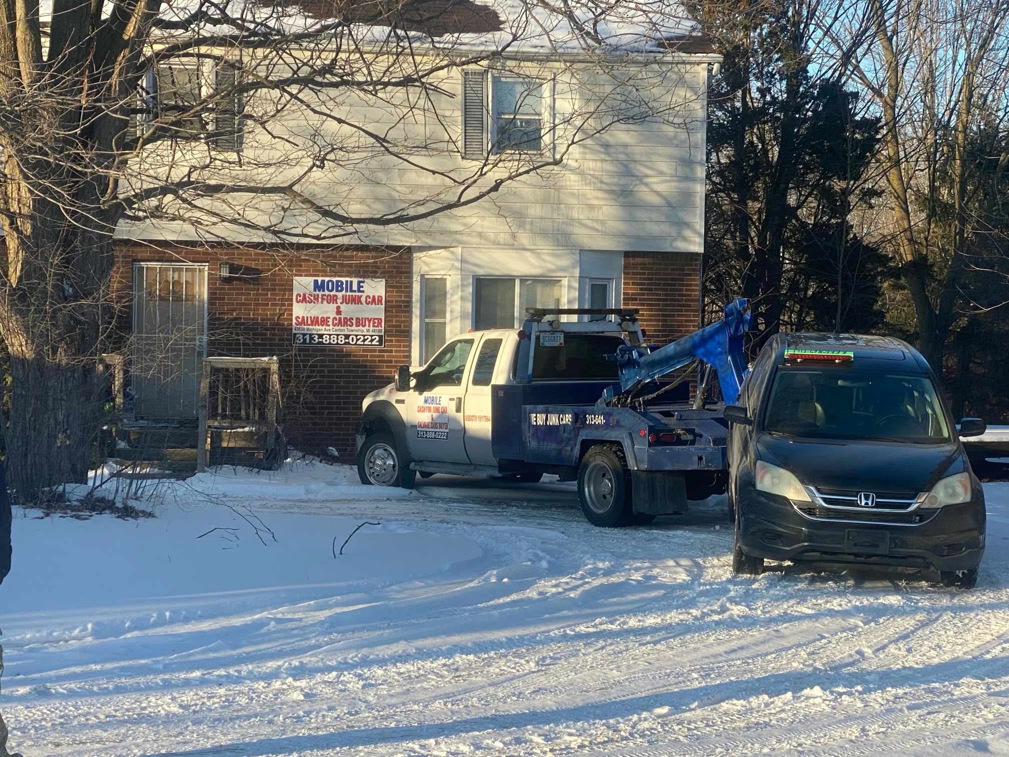 Mobile Cash for Junk Cars tow truck at a pickup location